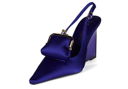 Blue high-heeled shoe with a matching handbag on a white background