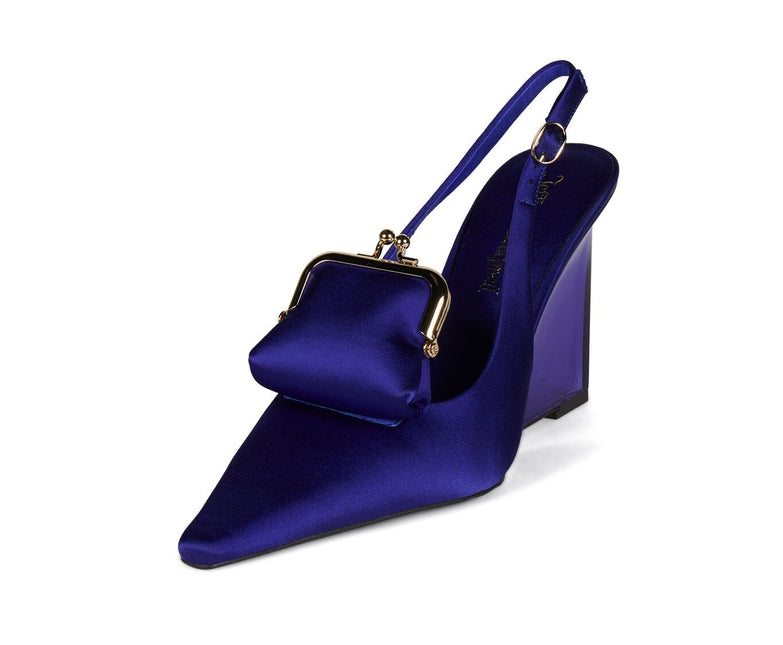 Blue high-heeled shoe with a matching handbag on a white background