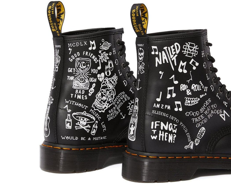 DR. MARTENS 1460 SCRIBBLE UNISEX BOOTS